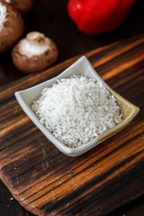 Beautiful white rice in a white ceramic bowl.