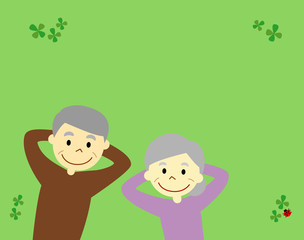 寝転がるシニア夫婦