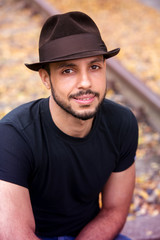 portrait of handsome young man with hat