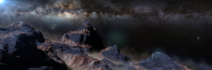 rocky landscape with low crawling fog lit by the Milky Way
