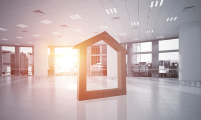 Conceptual background image of concrete home sign in modern office interior