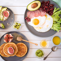 Breakfast on white table. Eye bird view 