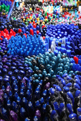 Obraz premium Automatic ballpoint pen. School supplies, stationery accessories. Colorful stationery. Stationery store. Goods for office and study.