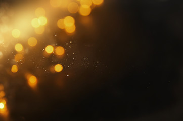 abstract bokeh background of golden light burst.