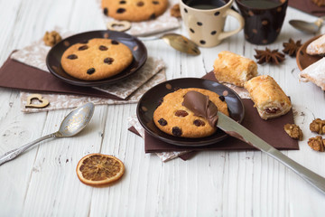 Tasty cookies with chocolate and coffee