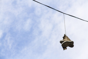 Shoes hanging on a thread, Havana, Cuba.