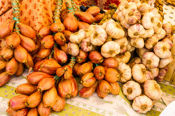 Strings of garlic and onions