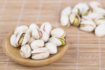 Pistachio nuts closeup.