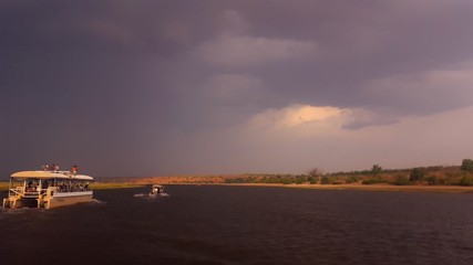 Moody storm skies over the Chobe River
