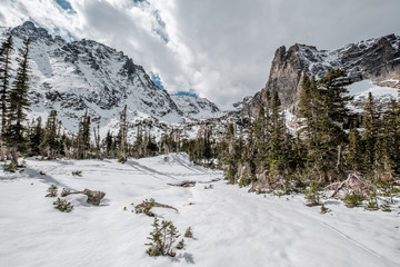 Fototapeta na wymiar Snowy landscape with rocks and mountains