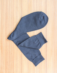 Men's socks on wood board,top view shot.