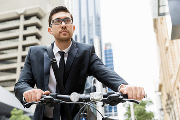 Young businessmen with a bike