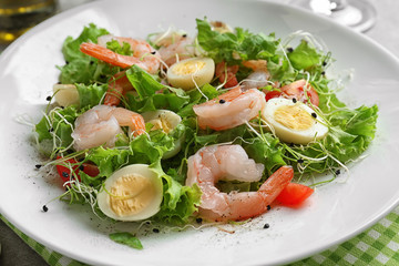 Plate with fresh tasty shrimp salad, closeup