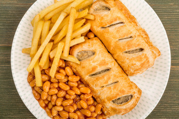 Sausage Rolls With Baked Beans Chips And French Fries