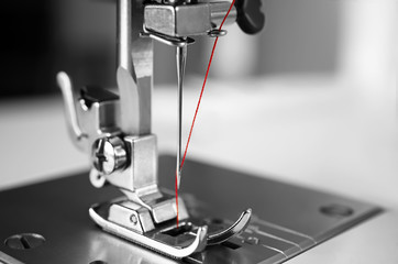 Sewing machine on table, closeup