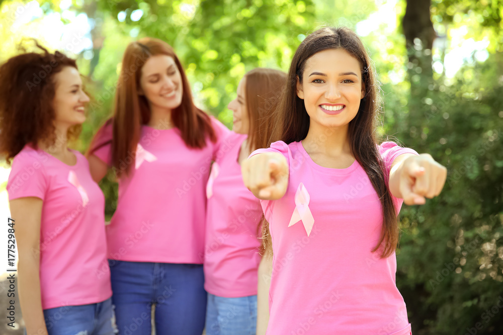 Canvas Prints Young woman in pink t-shirt outdoors. Breast cancer awareness concept