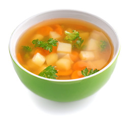 Ceramic bowl with soup for baby on white background