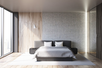Concrete and wooden bedroom