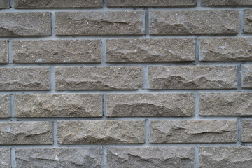 Brown brick wall. background