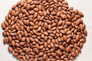 peeled almonds in background