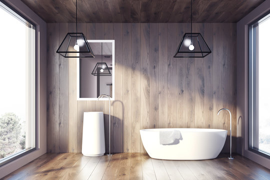 Loft wooden bathroom, tub and sink
