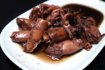 Fresh Adriatic squid in black sauce sea food at Thailand