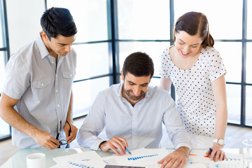 Group of happy young business people in a meeting