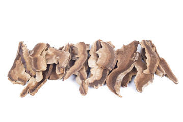 A Pile of dry Ganoderma lucidum slices on the white background.