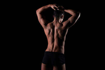 Obraz na płótnie Canvas weiblicher trainierter Rücken, Schultern und Arme, Lowkey
