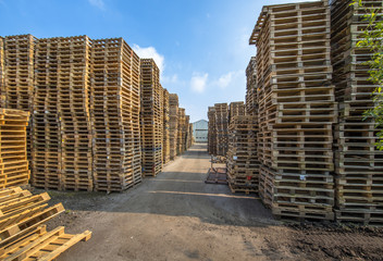 Business area with huge piles of cargo pallets