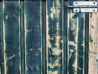 Old country scrubbed blue door with latch