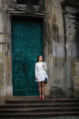 Walking traveling woman, ancient wall, place, city, full length