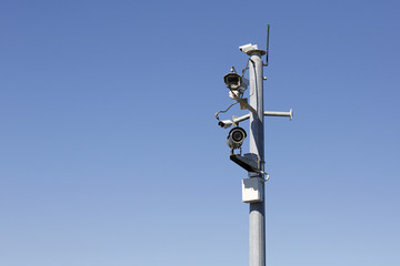 Security Camera with a blue sky background and copy space. 