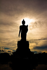 Large standing Buddha image shadows