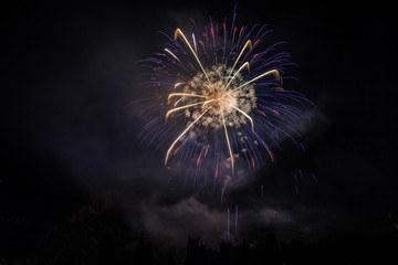 Colorful fireworks of traditional Santa Augusta celebration, Vittorio Veneto, Italy
