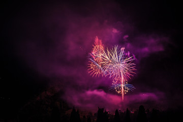 Colorful fireworks of traditional Santa Augusta celebration, Vittorio Veneto, Italy