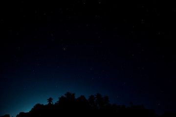 Naklejka premium Night blue sky stars background