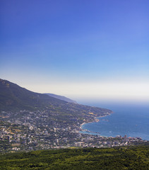 view from the height of the resort town of Yalta and the Black Sea from the mountains of Ai-Petri