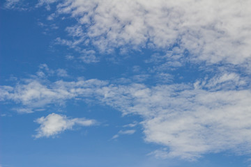 Aircraft flying under blue sky