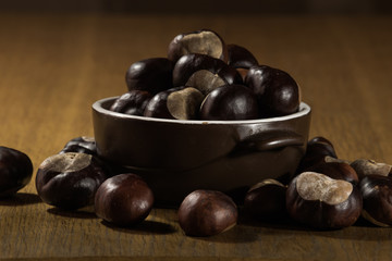 Chestnuts in a cup on the table