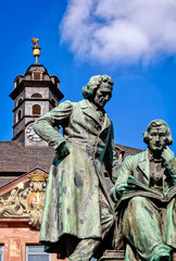 Fototapeta na wymiar Brothers Grimm looking down at the market square, Hanau, Germany