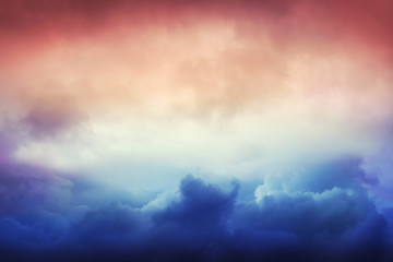 Fototapeta na wymiar Heavenly clouds on colorful sky.