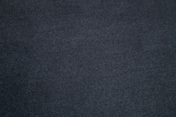 warm grey fleecy fabric laid out smooth rectangle
