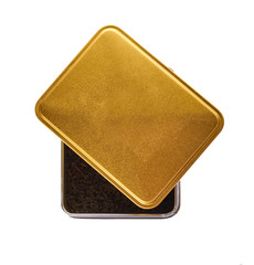 dry black tea leaves in box isolated on white background