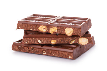 chocolate bar with nuts in hand isolated on white background