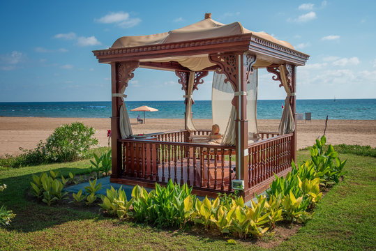 A Cozy Wooden Sea Bower On The Beach.