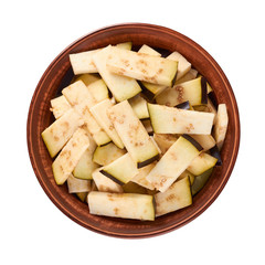 purple fresh organic eggplant slices in ceramic plate isolated on white background