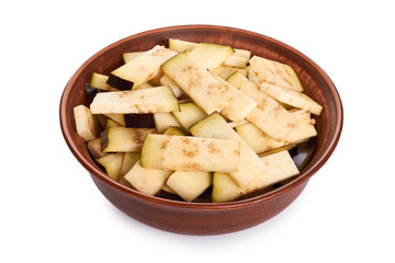 purple fresh organic eggplant slices in ceramic plate isolated on white background