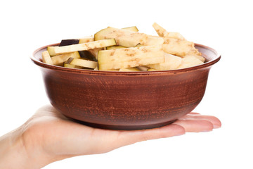 purple fresh organic eggplant slices in ceramic plate isolated on white background