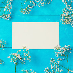 Floral background with paper note